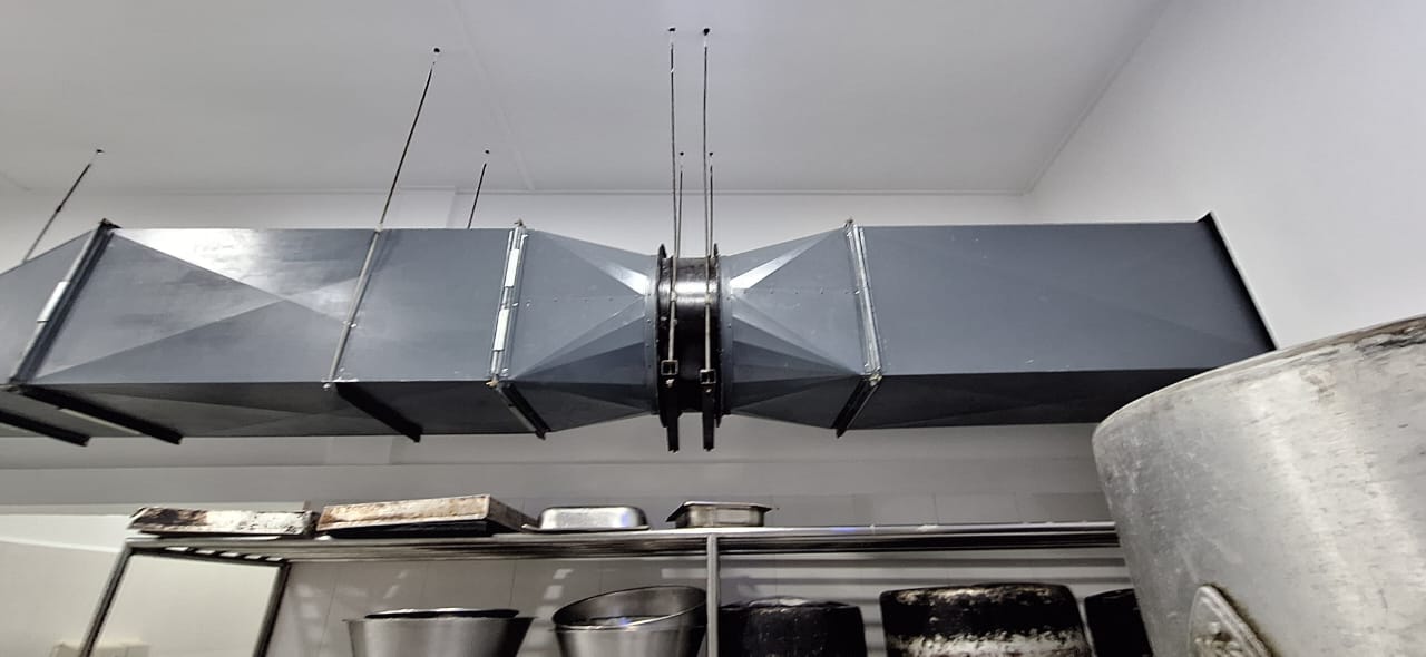 Ducting termination at wall with weather louvre
