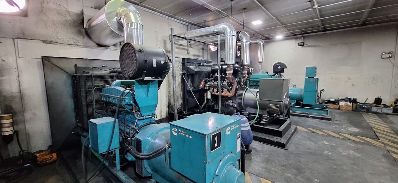 Resort genset room with insulated exhaust risers