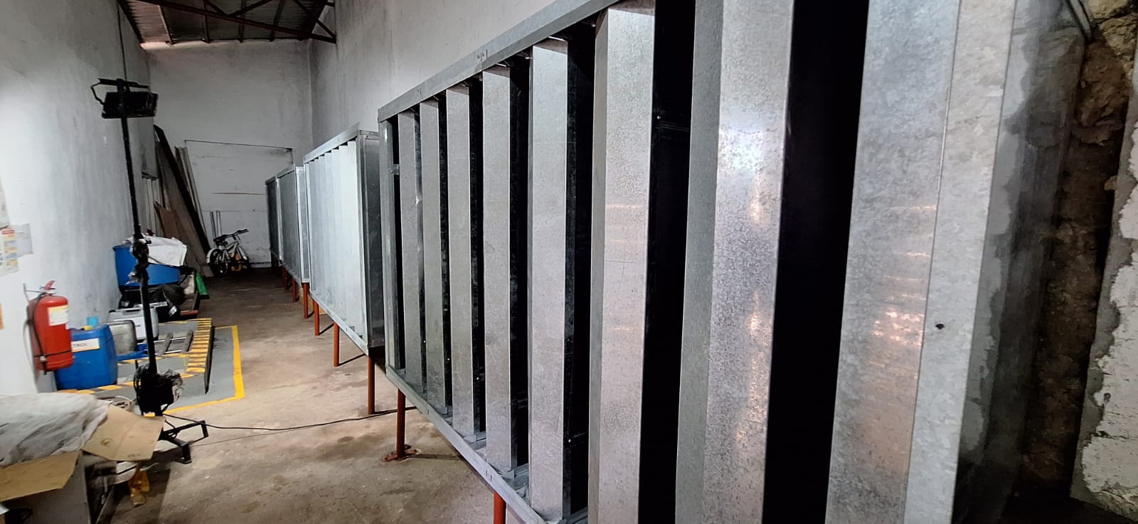 Row of splitter-type sound attenuators fabricated by NativeWay for a Maldives resort